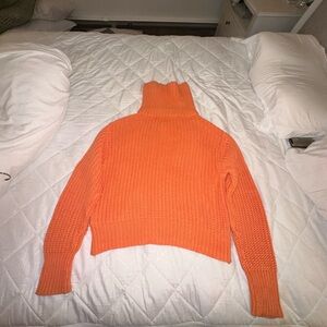 American Eagle tangerine colored cropped sweater with roll down collar